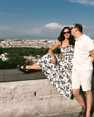 Samantha in a flowing black-and-white floral print maxi dress from Shein and Brooklyn Low Wedge Crocs, along with Kyle Busch (IMAGE: Instagram, Samantha Busch)